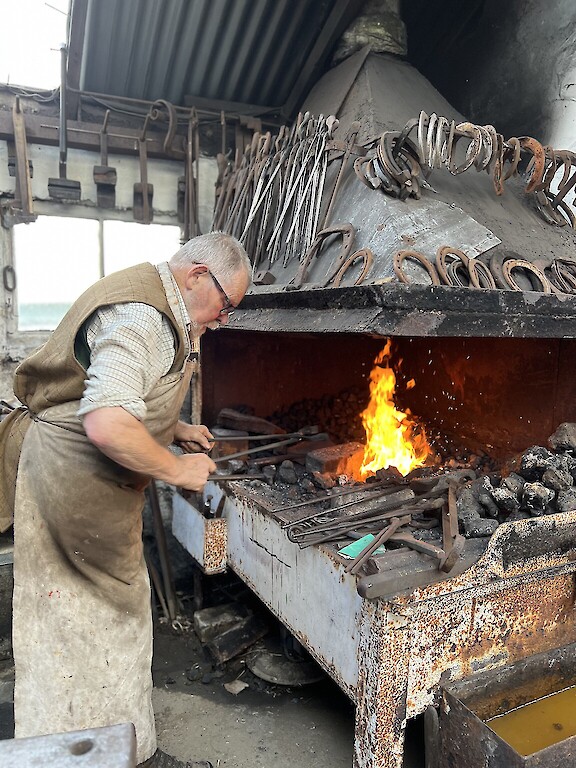 My dad at the forge